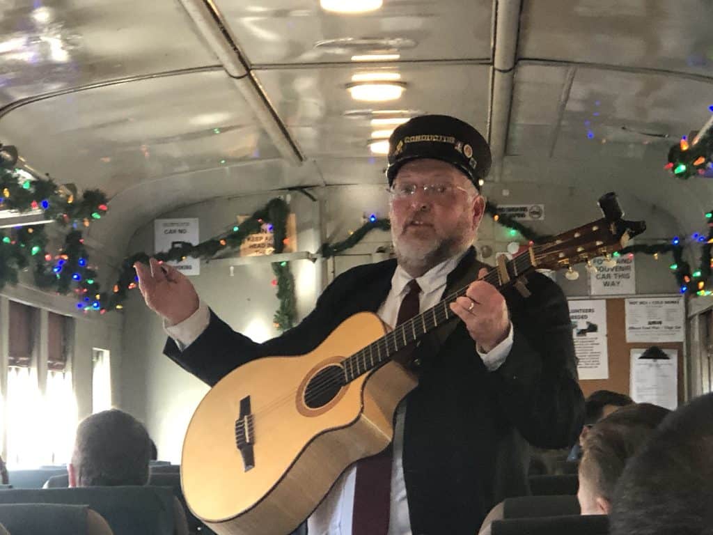 Roger serenading passengers